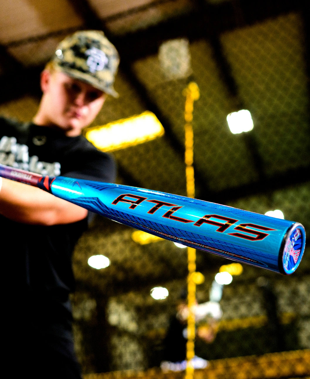 Player swinging the 2027 Louisville Slugger Atlas™ Hybrid -3 BBCOR Baseball Bat