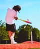 Young player hitting with the 2027 Louisville Slugger Supra™ -10 USA Baseball Bat