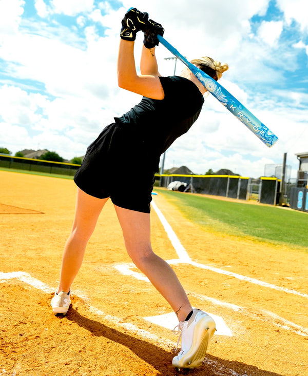 Player swinging the 2027 Louisville Slugger KRYO2 Fastpitch Bat