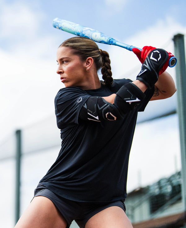 Fastpitch player at the plate wearing the Evoshield Pro-SRZ™ 3.0 Two-Piece Batter's Elbow Guard