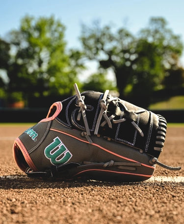 Wilson Fall 2024 Monica Abbott A2000® MA14SS 12.25" Fastpitch Glove on the infield dirt