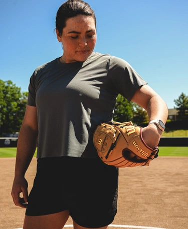 Rachel Garcia preparing to pitch with the Wilson Winter 2024 A2000® Rachel Garcia ASO 12" Fastpitch Glove