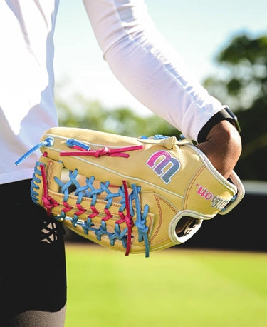 Player wearing the Wilson Winter 2024 A2000® T125 12.5" Fastpitch Glove