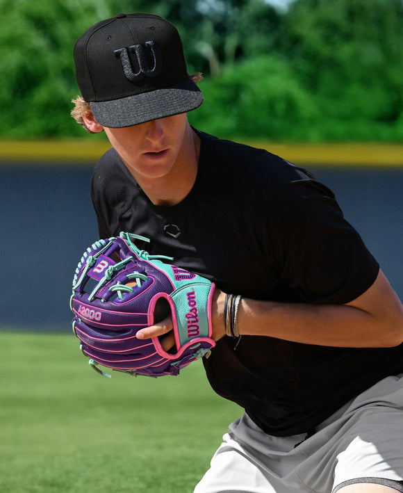 Player in the field using the Wilson Winter 2025 A2000® DP15SS 11.5" Baseball Glove