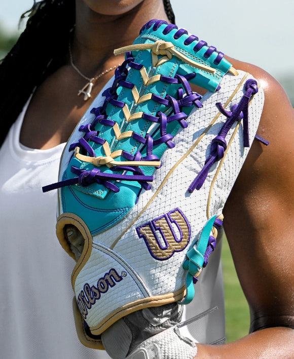 Player wearing the Wilson Winter 2025 A2000® T125SS 12.5" Fastpitch Glove