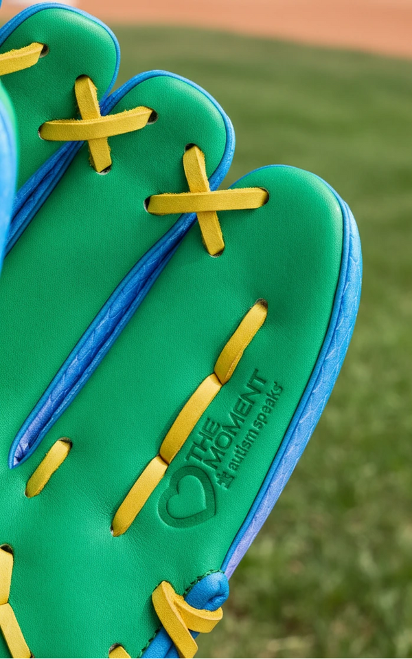 Close-up of the Autism Speaks stamp on the inside of the Wilson A2000® 1786SS Love the Moment™ Noah's Edition 11.5" Baseball Glove