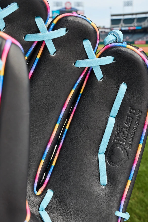 Close-up of the Autism Speaks® stamp on the inside of the Wilson A2000® 1750 Love the Moment™ 12.5" Baseball Glove