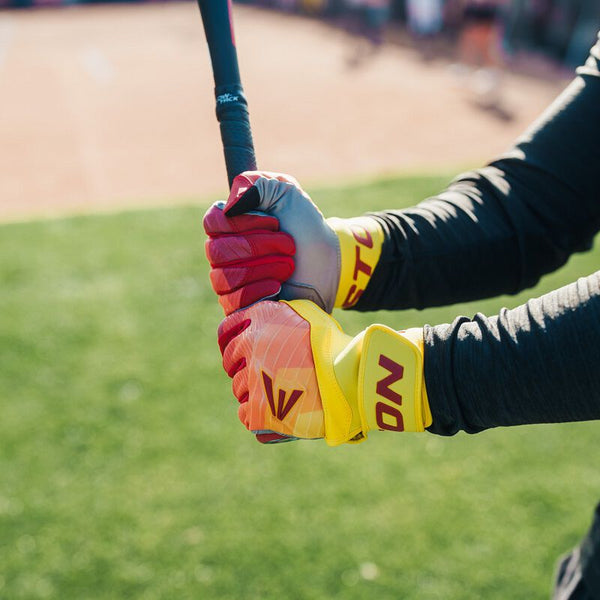 Player with a bat wearing the Easton Walk-Off Ethos Batting Gloves