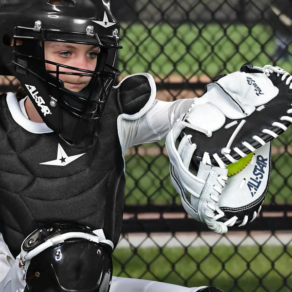 Youth catcher using the All Star Future Star™ 32.5" Youth Fastpitch Catchers Mitt