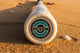 End cap on the 2026 Combat MFG Spec H1 Hybrid Coastal Collective Uluwatu -3 BBCOR Baseball Bat