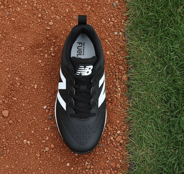 Top view of the New Balance Youth 4040 v8 Molded Cleat - Black/White