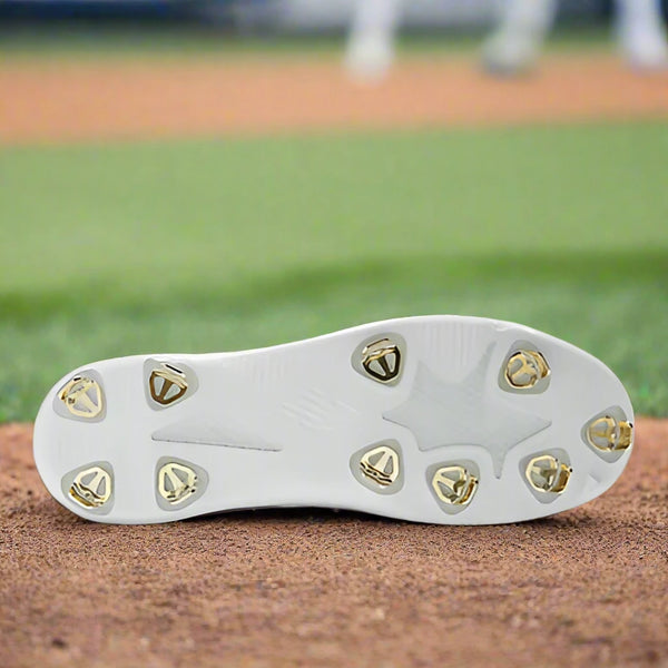 View of the sole of the New Balance FuelCell Ohtani 1 Metal Cleat - White/Metallic Gold