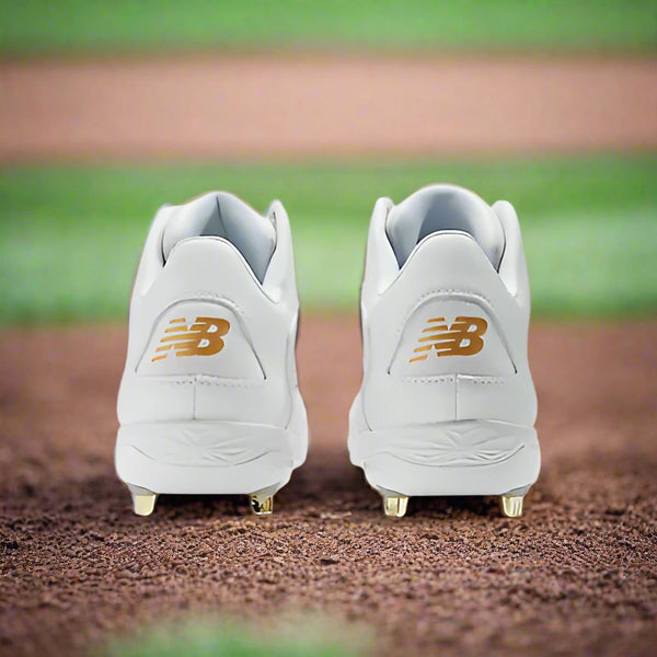Rear view of the New Balance FuelCell Ohtani 1 Metal Cleat - White/Metallic Gold