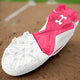 View of the sole of the Under Armour Leadoff Low RM Jr. 3.0 Youth Molded Cleat - Pink/White