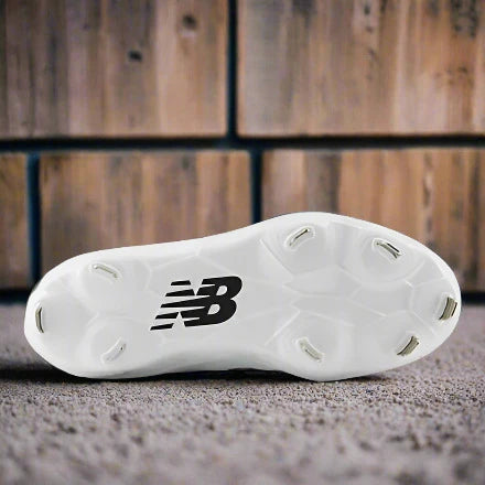 Bottom view of the New Balance Fresh Foam X Velo v4 Metal Softball Cleat - White w/ Black