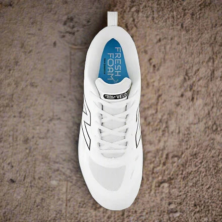 Overhead view of the New Balance Fresh Foam Velo v4 Molded Softball Cleat - White w/ Black