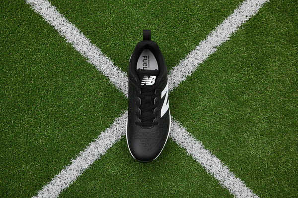 Top view of the New Balance 4040 v8 Youth Turf Trainer - Black/White