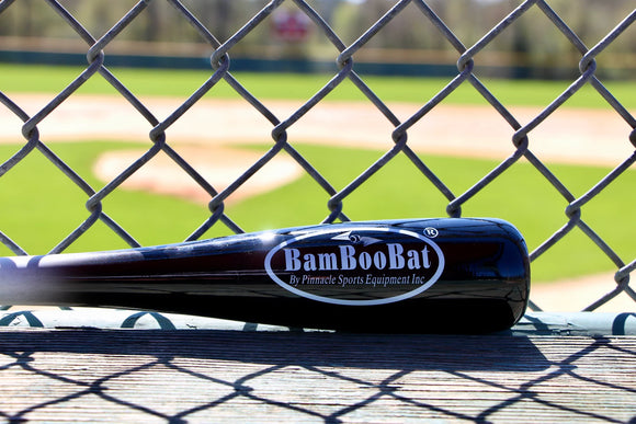 BamBooBat 21” Bamboo Training Bat in the dugout